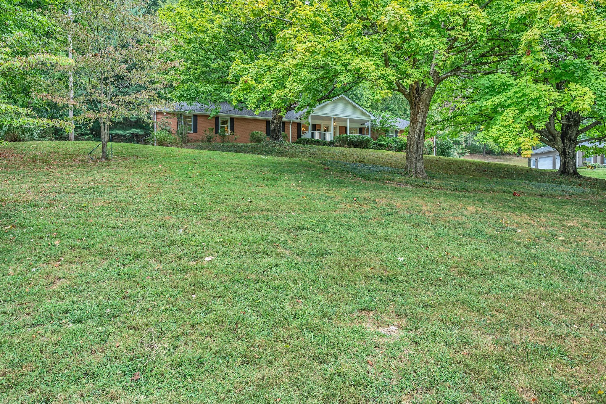 6620 Ellesmere Road Nashville, TN 37205 - Photo 1 of 45 Welcome to this charming all-brick home located at 6620 Ellesmere Rd!