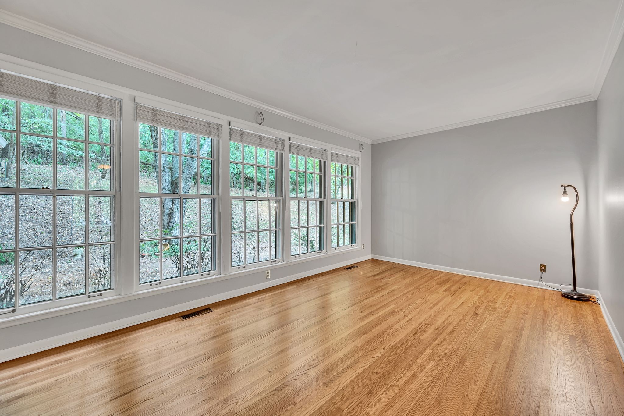 6620 Ellesmere Road Nashville, TN 37205 - Photo 11 of 45 With a fireplace and large windows that flood the space with natural light, this formal living room is perfiect for gatherings.