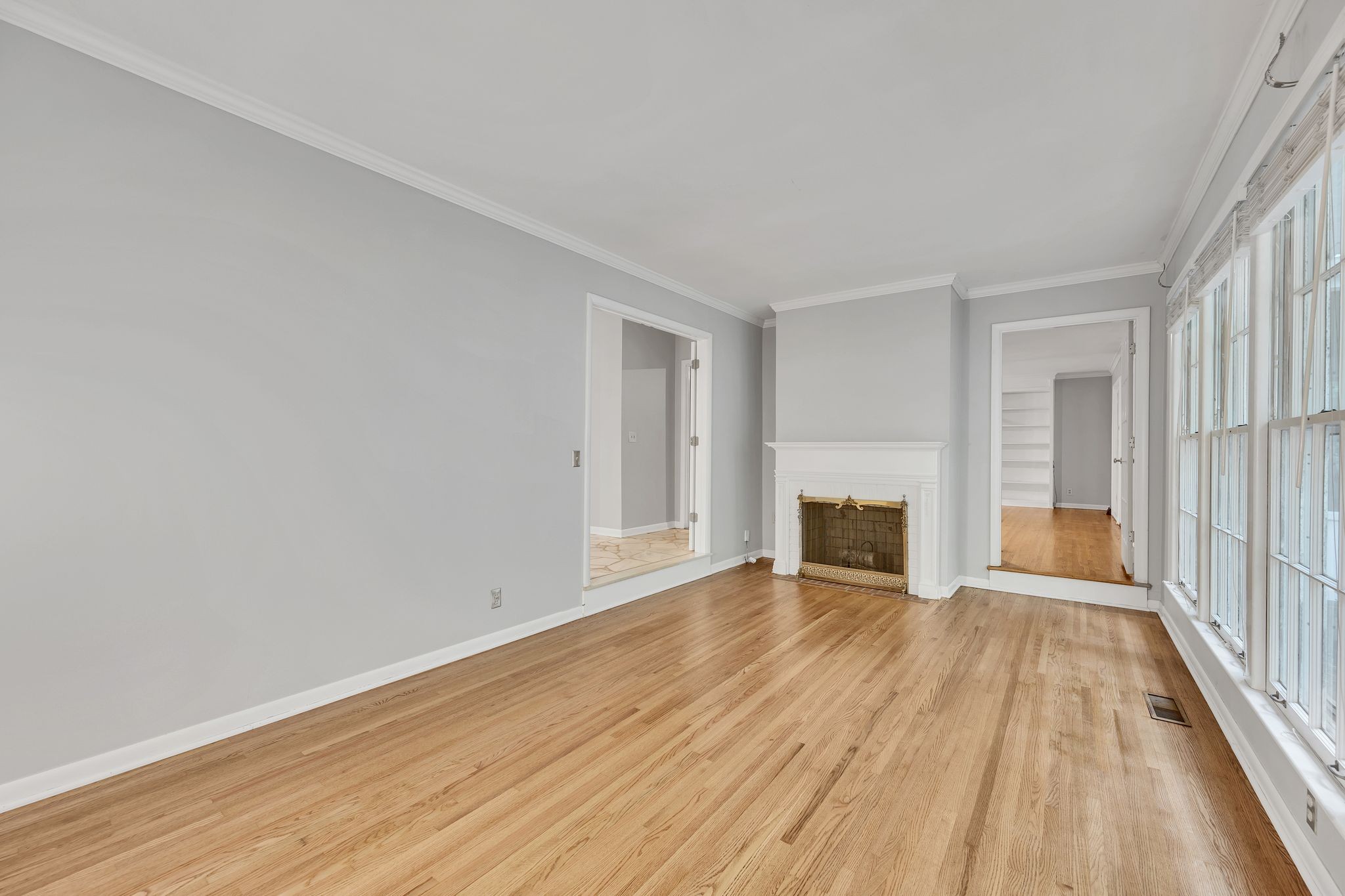 6620 Ellesmere Road Nashville, TN 37205 - Photo 13 of 45 With a fireplace and large windows that flood the space with natural light, this formal living room is perfiect for gatherings.