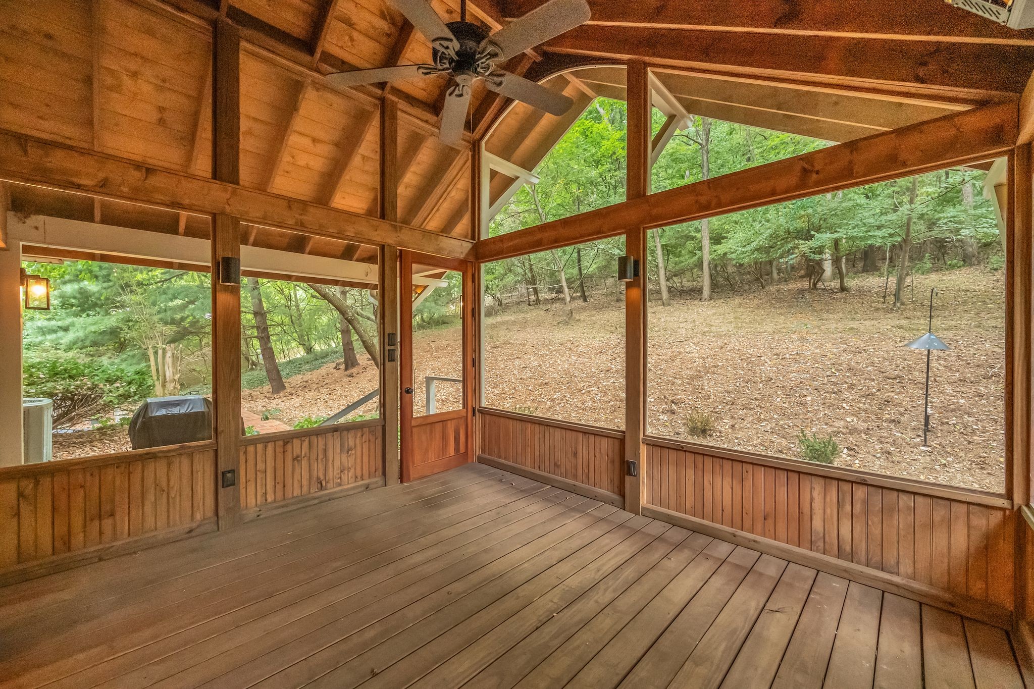 6620 Ellesmere Road Nashville, TN 37205 - Photo 38 of 45 Relax and soak in the breathtaking views of nature from the screened-in patio, where abundant wildlife adds to the tranquility.