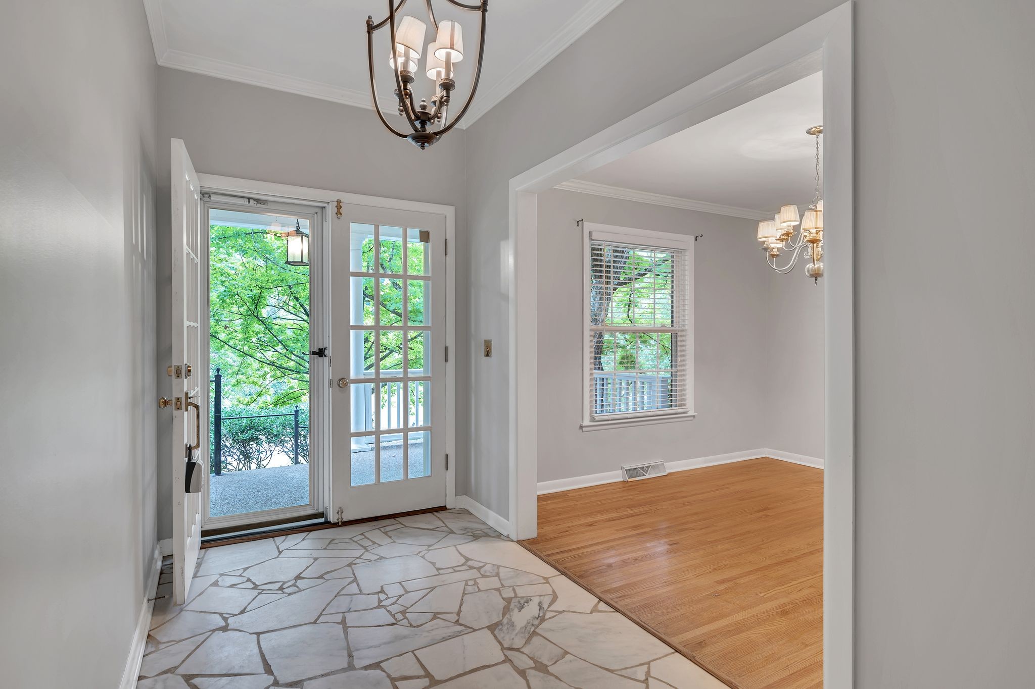 6620 Ellesmere Road Nashville, TN 37205 - Photo 7 of 45 Step into elgance with a large foyer featuring stunning marble flooring, offering a welcoming first impression.