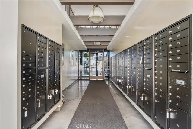 a view of entryway with stairs and wooden floor
