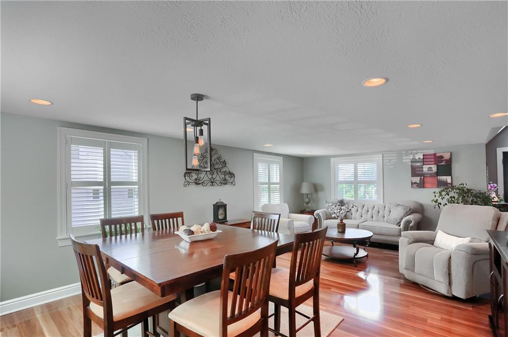 24 Herbst Road Coraopolis, PA 15108 - Photo 12 of 50 a view of a dining room with furniture and wooden floor
