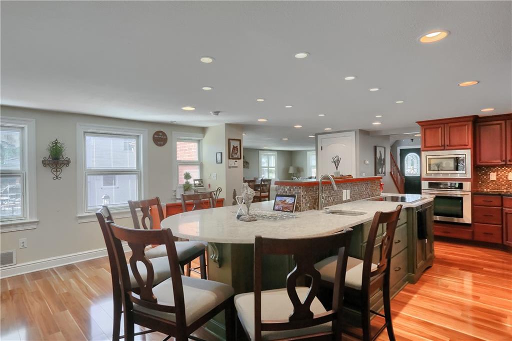 24 Herbst Road Coraopolis, PA 15108 - Photo 15 of 50 a view of a dining room with furniture window and wooden floor