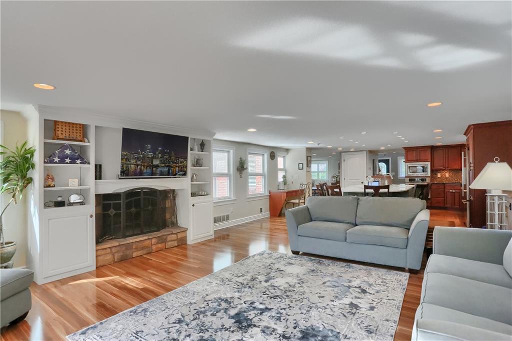 24 Herbst Road Coraopolis, PA 15108 - Photo 21 of 50 a living room with furniture and a fireplace