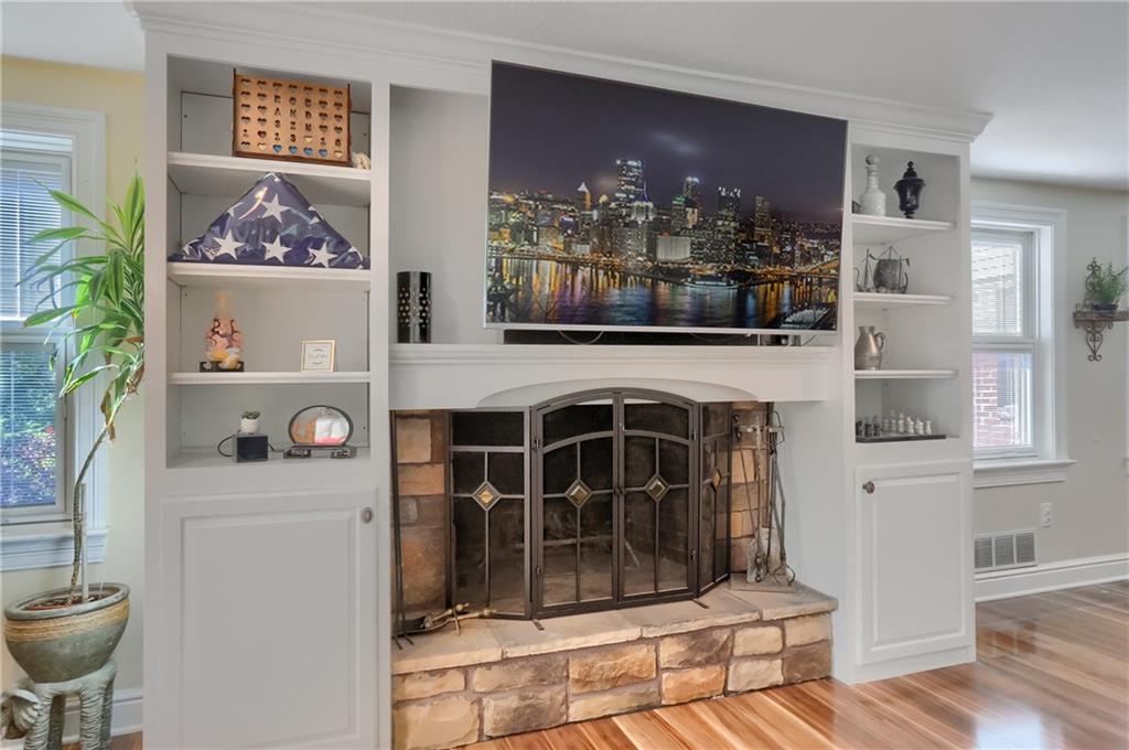 24 Herbst Road Coraopolis, PA 15108 - Photo 23 of 50 a living room with furniture and a fireplace