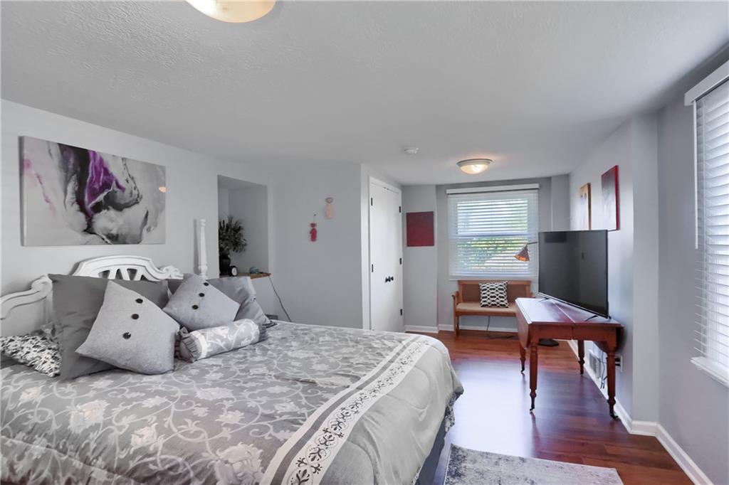 24 Herbst Road Coraopolis, PA 15108 - Photo 33 of 50 a bed room with a bed and a chair