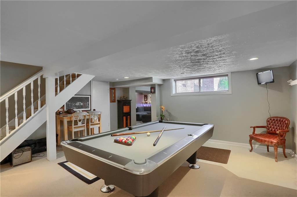 24 Herbst Road Coraopolis, PA 15108 - Photo 36 of 50 a room with pool table and a flat screen tv