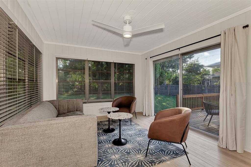 1726 Floyd Street Sarasota, FL 34239 - Photo 21 of 52 a living room with furniture and a large window