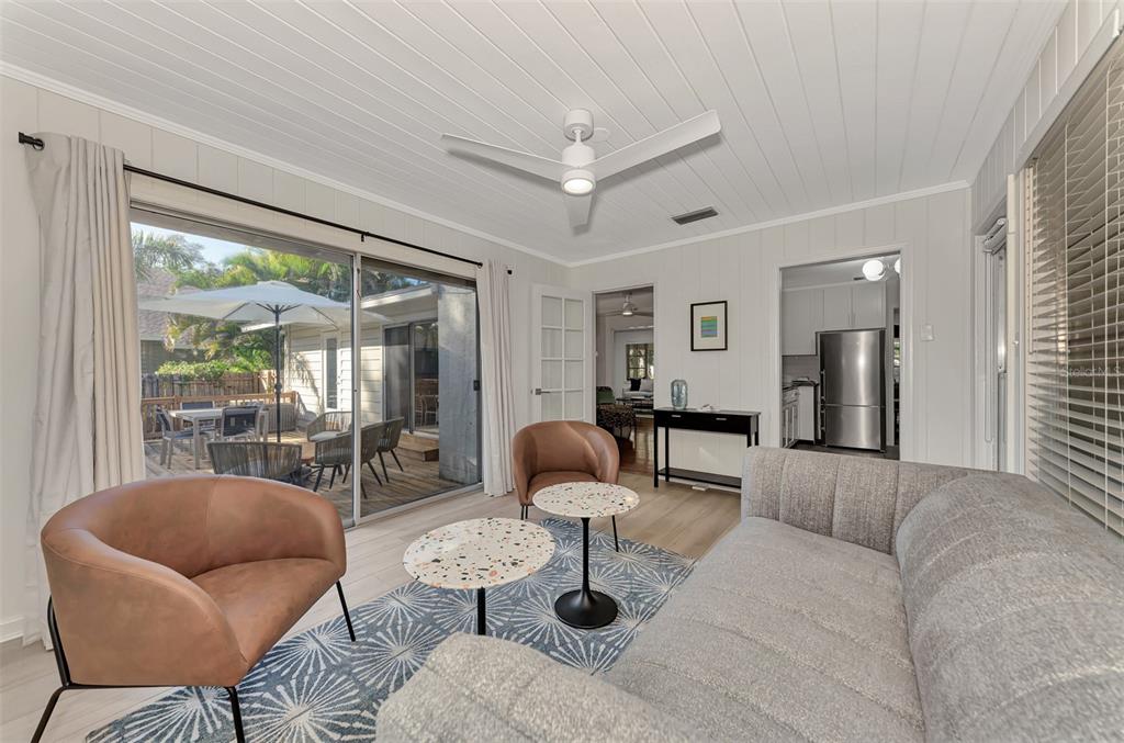1726 Floyd Street Sarasota, FL 34239 - Photo 24 of 52 a living room with furniture and a large window