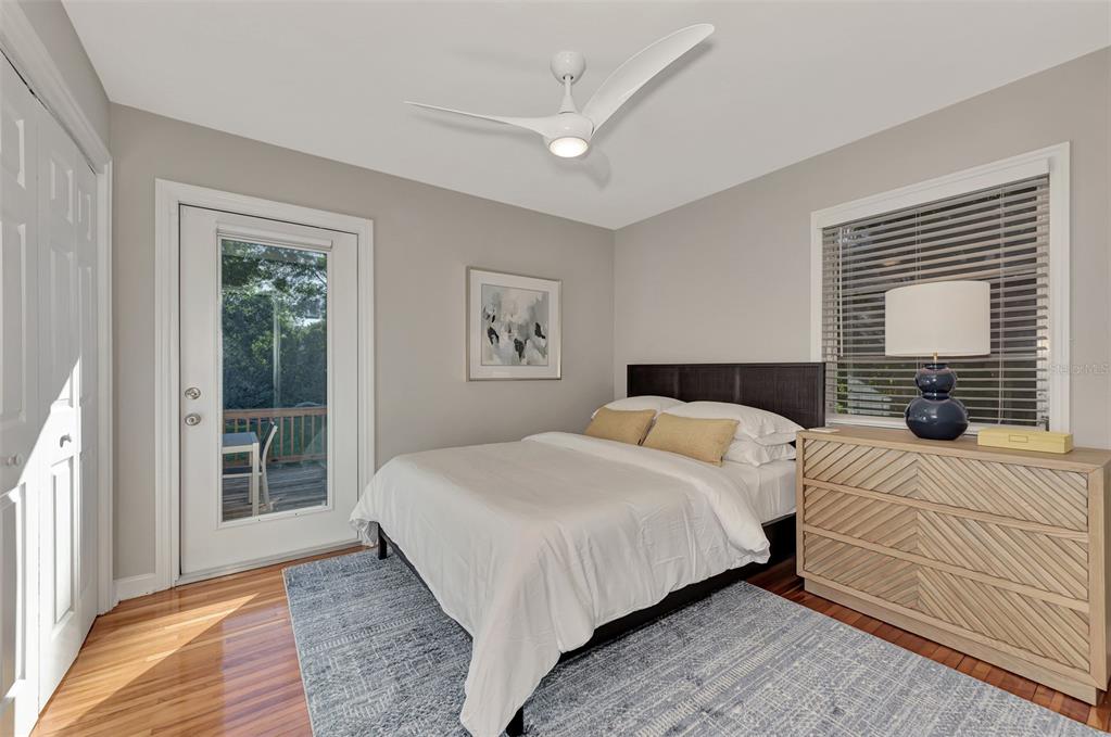 1726 Floyd Street Sarasota, FL 34239 - Photo 32 of 52 a bedroom with a large bed and a window