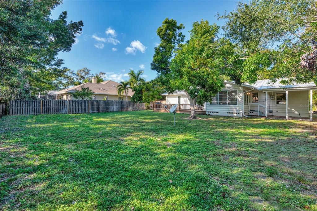1726 Floyd Street Sarasota, FL 34239 - Photo 39 of 52 a view of a house with a backyard