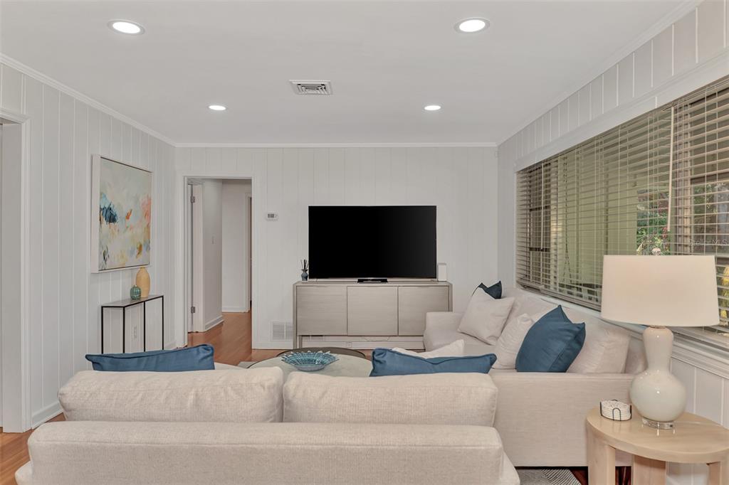 1726 Floyd Street Sarasota, FL 34239 - Photo 7 of 52 a living room with furniture and a flat screen tv