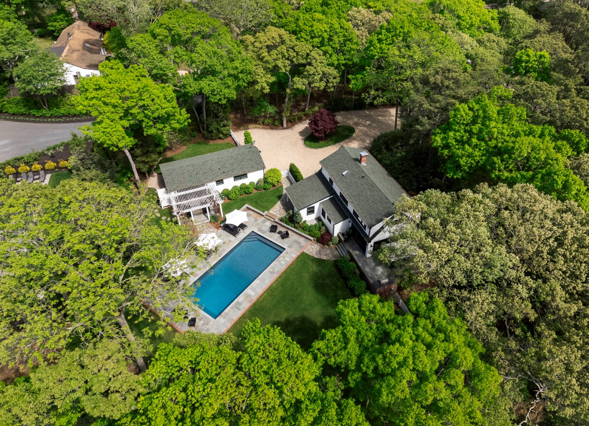 91 East Tiana Road Hampton Bays, NY 11946 - Photo 41 of 46 an aerial view of a house with a yard