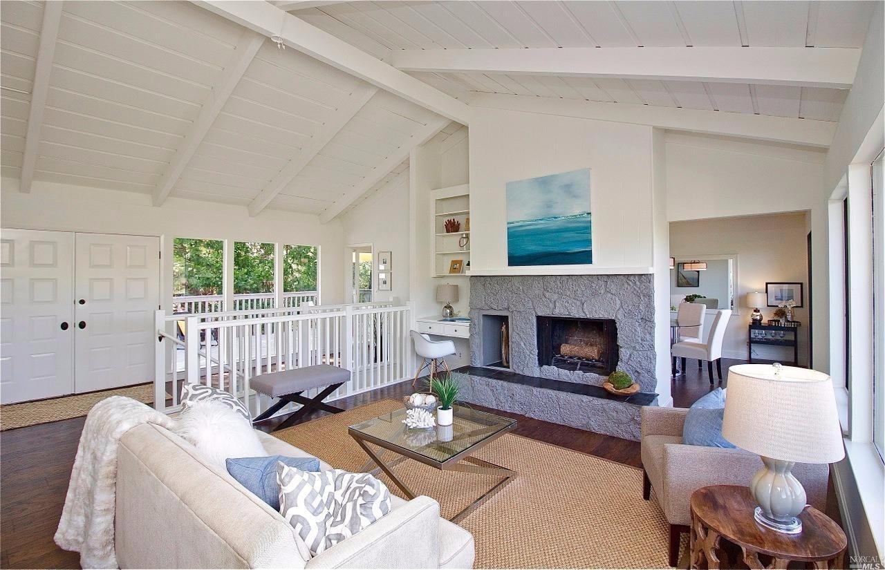 11 Park Ridge Road San Rafael, CA 94903 - Photo 1 of 1 a living room with furniture and a fireplace