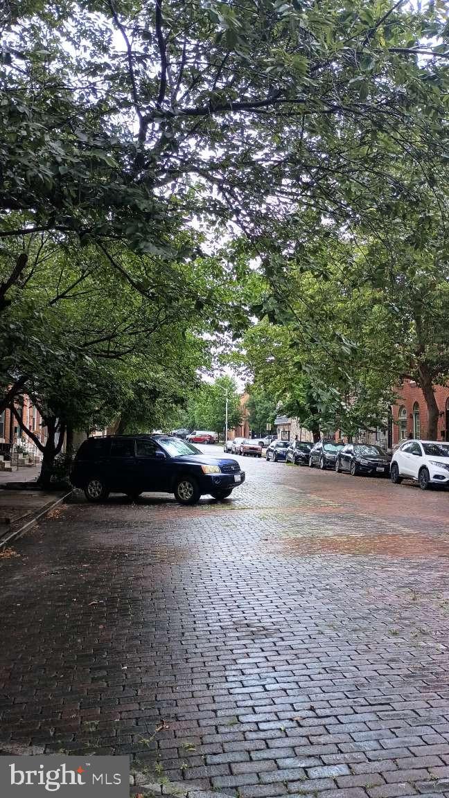 28 South Potomac Street Baltimore, MD 21224 - Photo 2 of 20 a view of street with parked cars