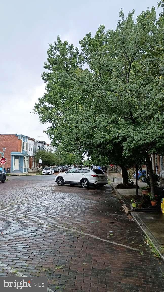 28 South Potomac Street Baltimore, MD 21224 - Photo 3 of 20 a view of street with parked cars