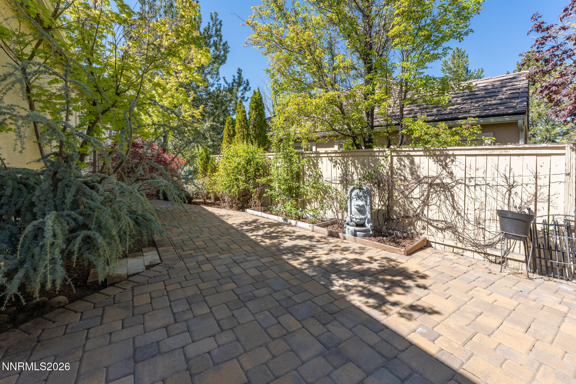 1840 Hunter Creek Road Reno, NV 89519 - Photo 28 of 39 a view of a yard with plants and trees