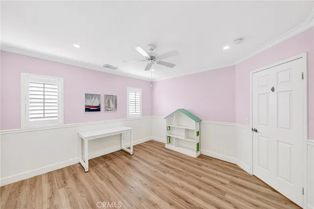 a bathroom with a granite countertop sink mirror and shower
