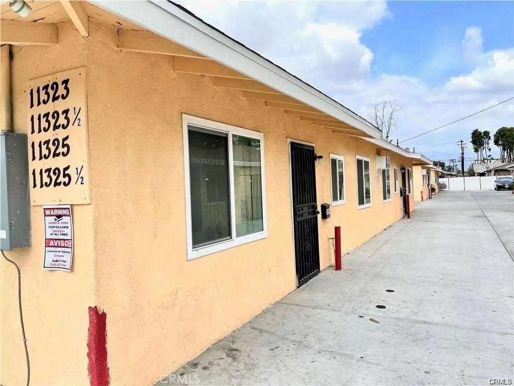 11323 Schmidt Road El Monte, CA 91733 - Photo 2 of 12 a view of a building with pathway