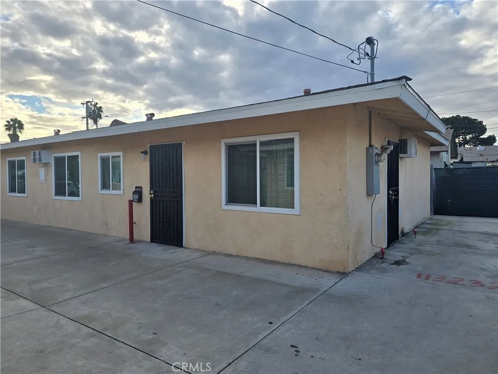 11323 Schmidt Road El Monte, CA 91733 - Photo 3 of 12 a view of a house with roof
