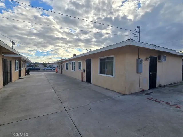 a view of a house with a street
