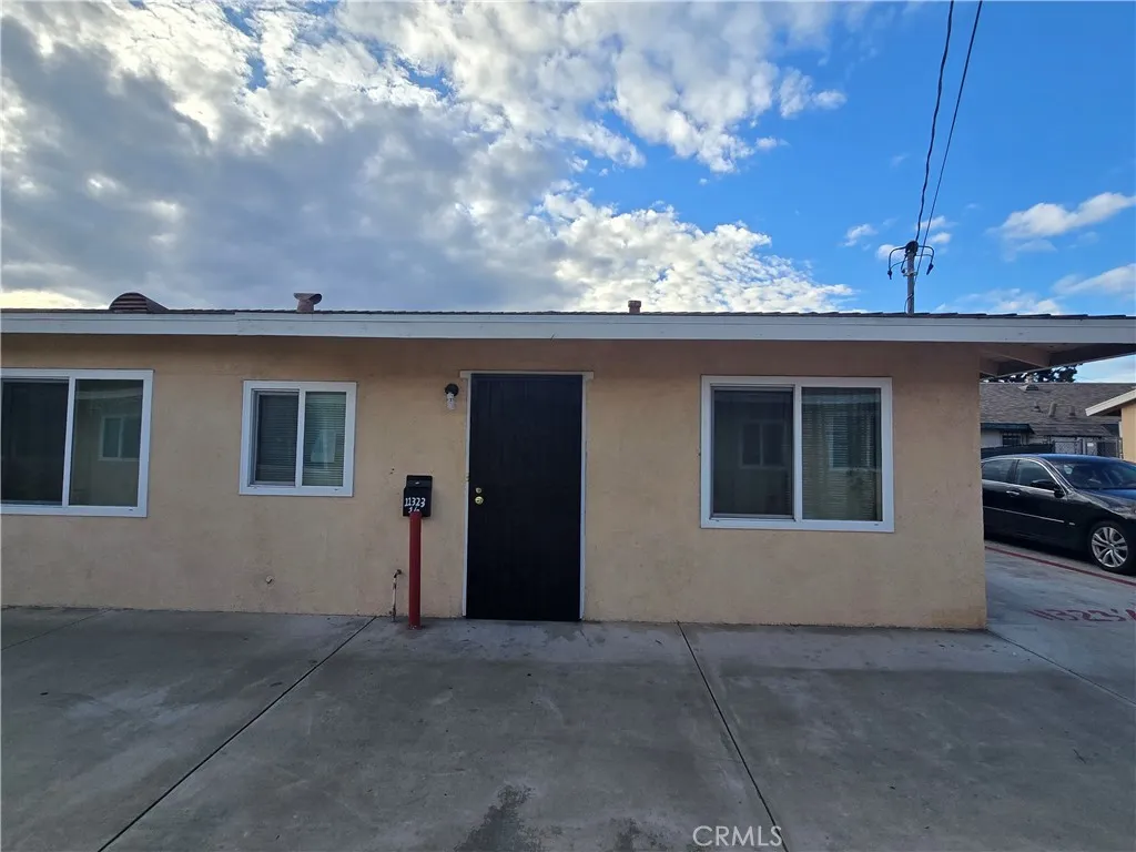 11323 Schmidt Road El Monte, CA 91733 - Photo 5 of 12 a view of a house with a backyard