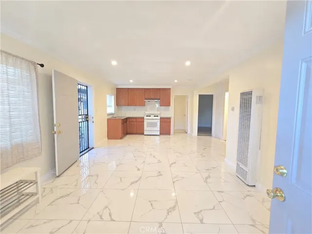 a large white room with a large window