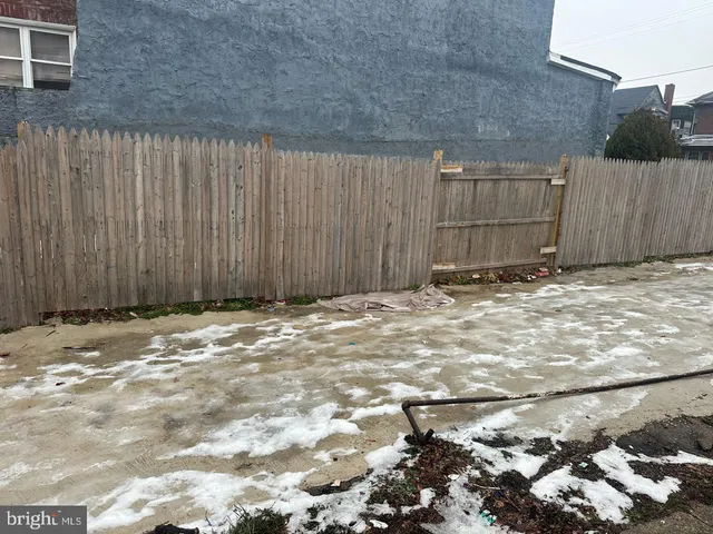 a view of a backyard of a house