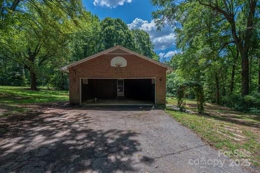 5955 Reepsville Road Vale, NC 28168 - Photo 17 of 48 a front view of a house with a yard
