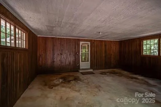 an empty room with windows