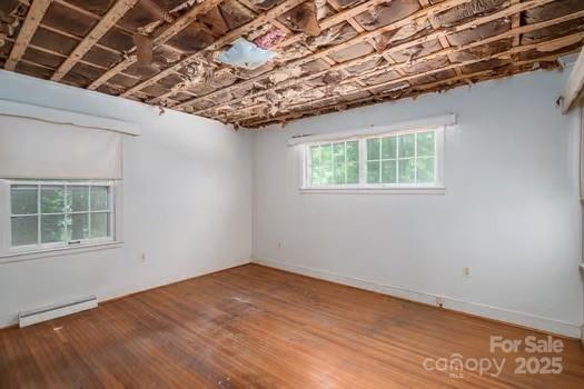 5955 Reepsville Road Vale, NC 28168 - Photo 30 of 48 a view of empty room with wooden floor and fan