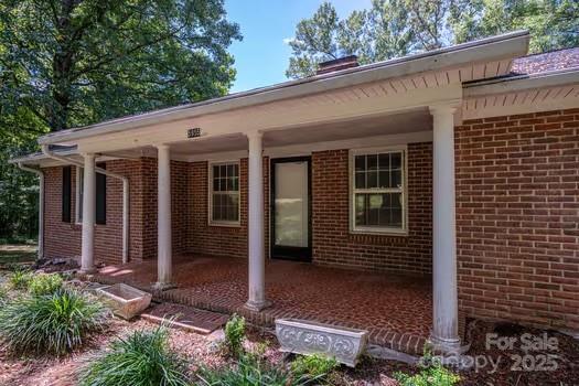 5955 Reepsville Road Vale, NC 28168 - Photo 3 of 48 a view of a house with a yard and potted plants
