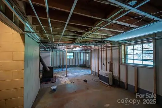 a view of a big yard with large trees