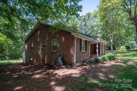 5955 Reepsville Road Vale, NC 28168 - Photo 4 of 48 a view of a house with a yard