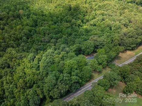 5955 Reepsville Road Vale, NC 28168 - Photo 43 of 48 an aerial view of residential house with outdoor space and trees all around
