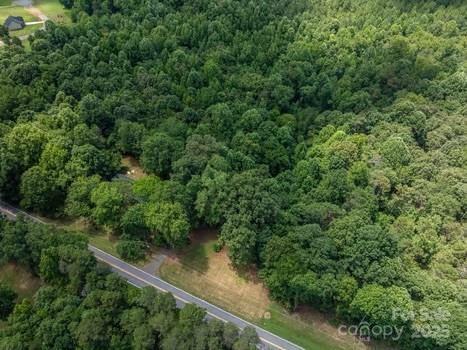 5955 Reepsville Road Vale, NC 28168 - Photo 44 of 48 an aerial view of residential house with outdoor space and trees around