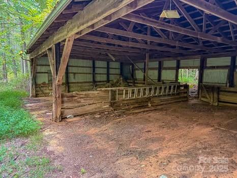 5955 Reepsville Road Vale, NC 28168 - Photo 46 of 48 a view of porch with wooden stairs