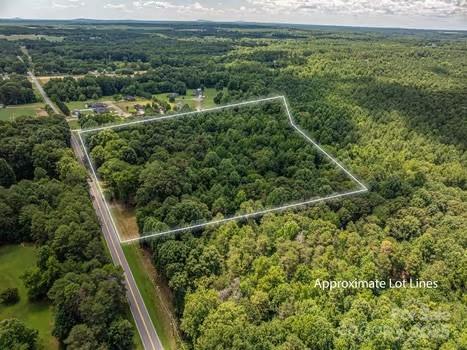 5955 Reepsville Road Vale, NC 28168 - Photo 48 of 48 a view of a yard with a lake