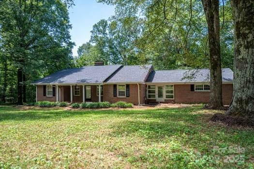 5955 Reepsville Road Vale, NC 28168 - Photo 7 of 48 a front view of a house with garden
