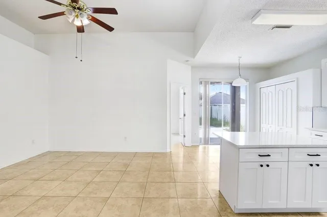 a view of an entryway with kitchen