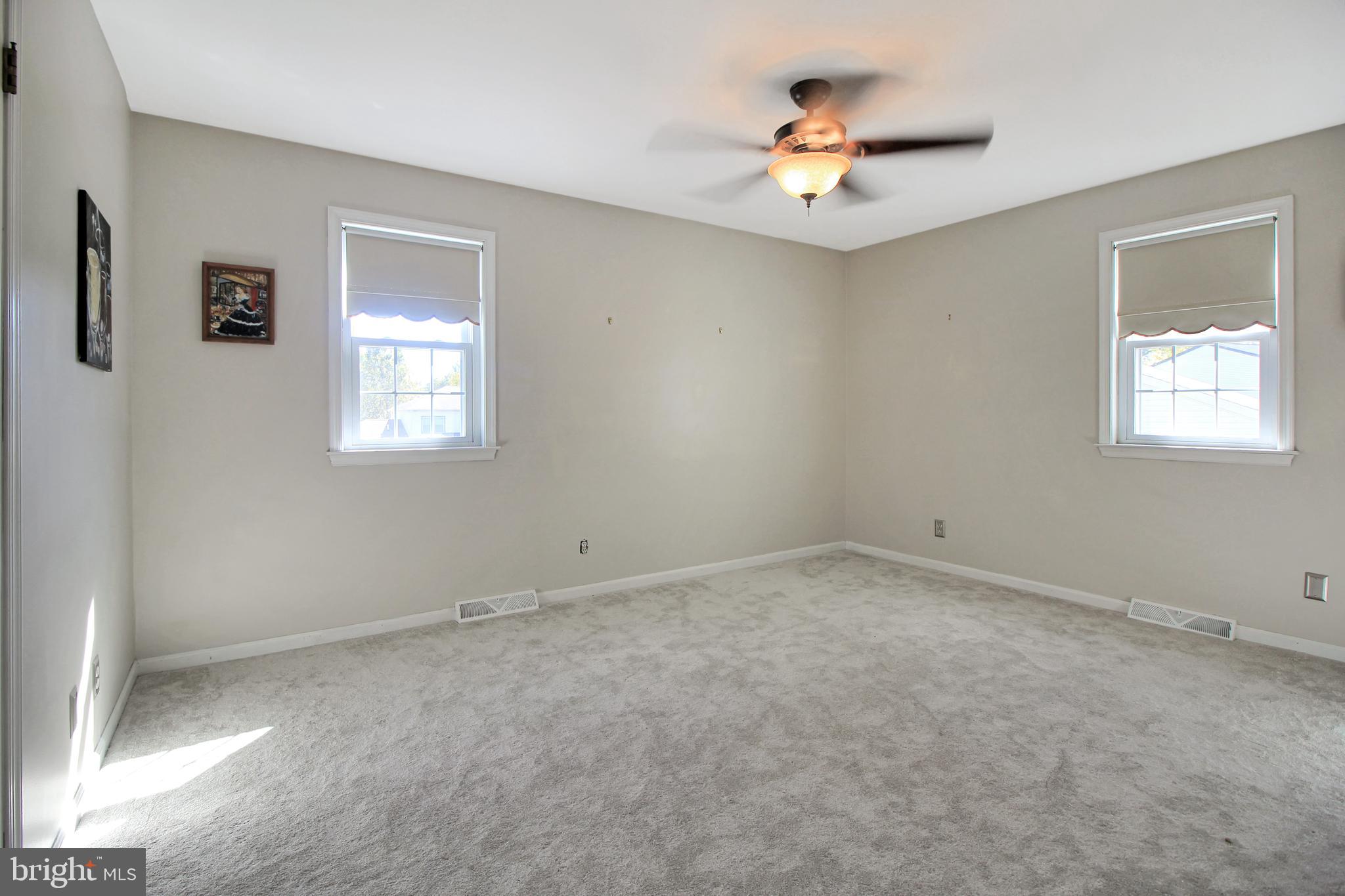 107 David Lane Lansdale, PA 19446 - Photo 28 of 43 a view of a livingroom with a ceiling fan and window