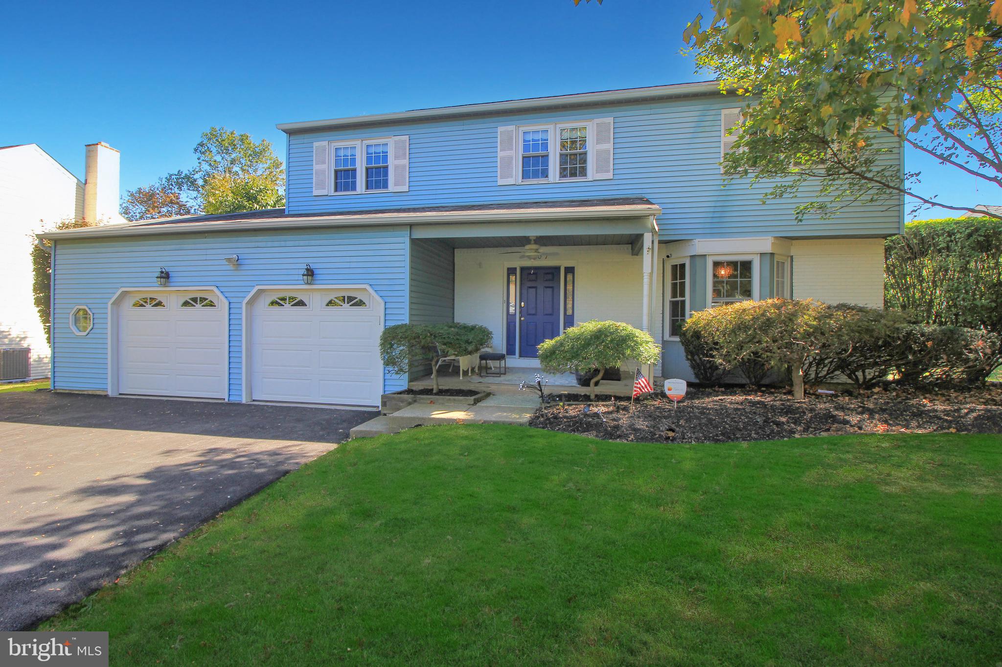 107 David Lane Lansdale, PA 19446 - Photo 3 of 43 a front view of a house with garden