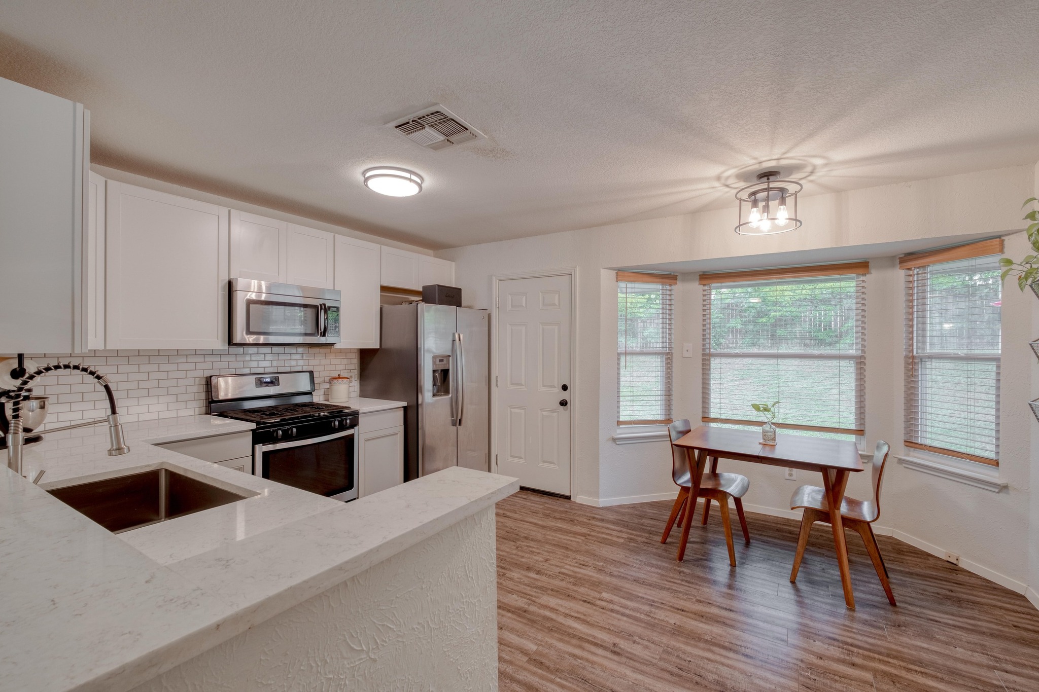 12030 Rotherham Drive Austin, TX 78753 - Photo 11 of 19 Kitchen overlooks the living room, perfect for entertaining.