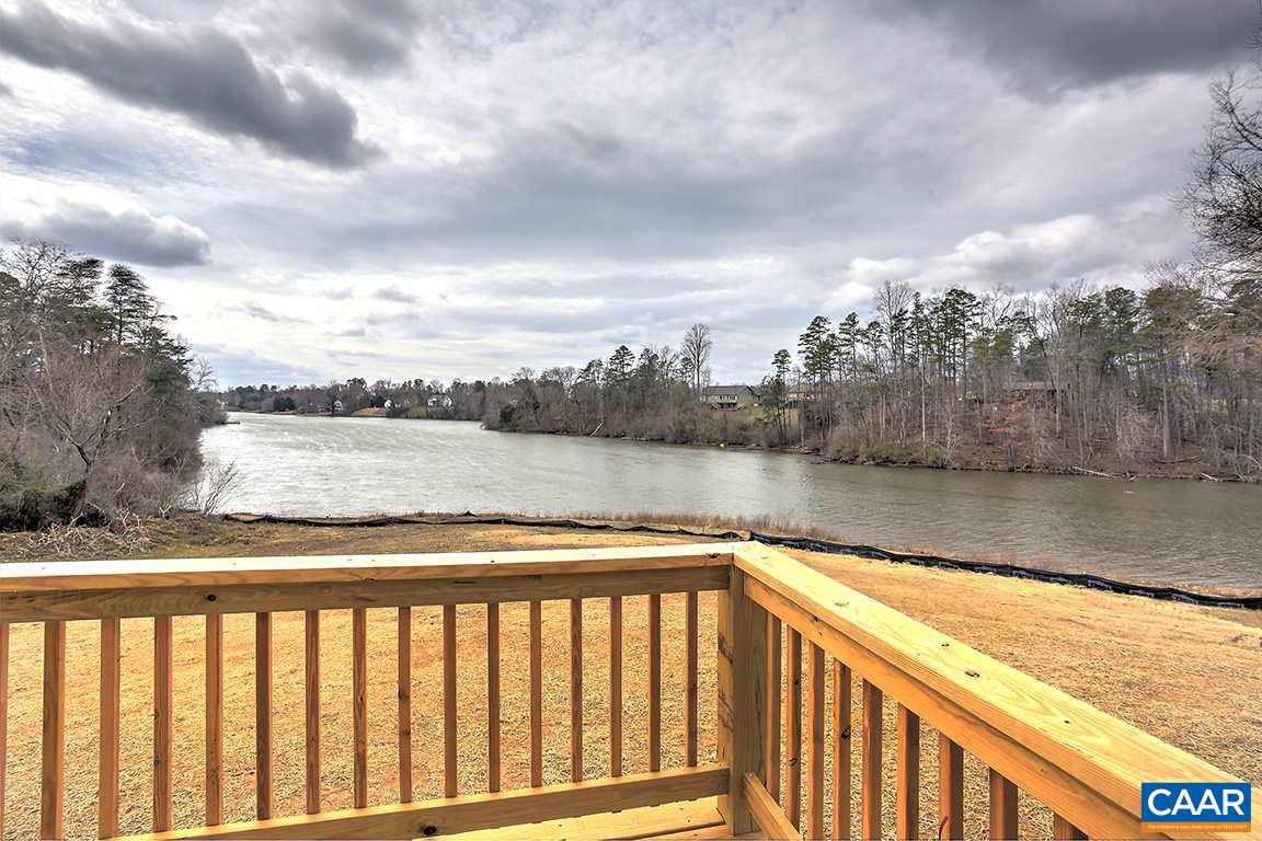 663 Pine Bluff Road Ruckersville, VA 22968 - Photo 17 of 24 a view of swimming pool from a lake