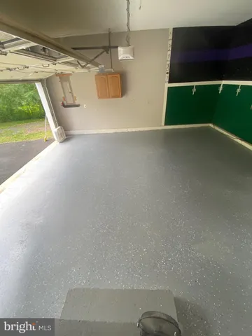 a view of a swimming pool and an outdoor space