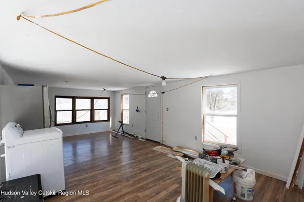 a room with furniture and a window
