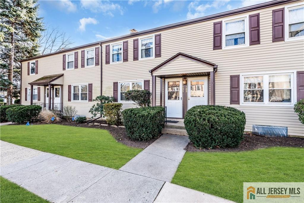 191 Rose Street Metuchen, NJ 08840 - Photo 5 of 20 a view of a house with a garden
