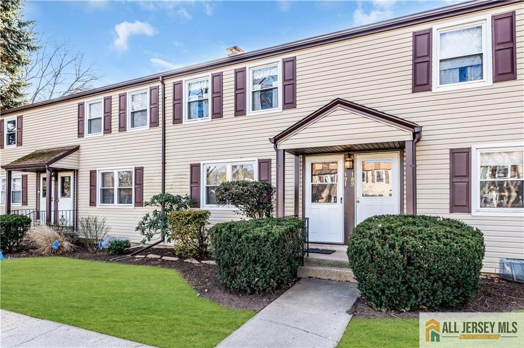 191 Rose Street Metuchen, NJ 08840 - Photo 6 of 20 a front view of a house with garden