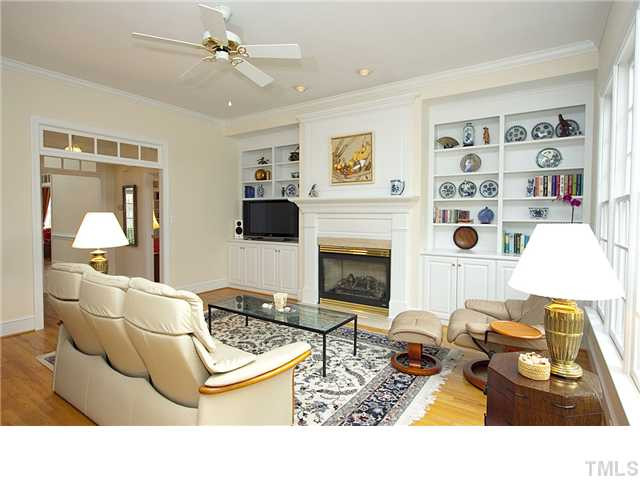 3312 Tall Tree Place Raleigh, NC 27607 - Photo 4 of 12 A wonderful view of custom bookcases on both sides of fireplace creates a warmth to room that everyone will enjoy. Den/Family/Great Room